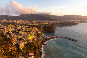 Sorrento city and coast with golden sunset