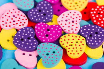 Multicolored buttons in the shape of heart
