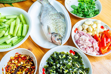 Fresh vegetables and meat on a table