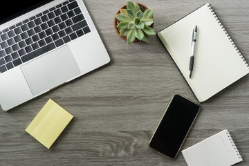 Flat lay laptop grey background