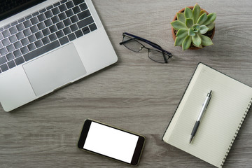 Flat lay laptop grey background