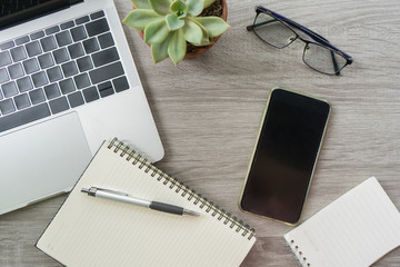 Flat lay laptop grey background