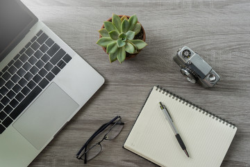 Flat lay laptop grey background