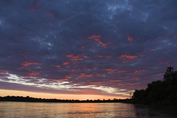Fototapeta na wymiar Sunrise over River in the Brasil Pantanal