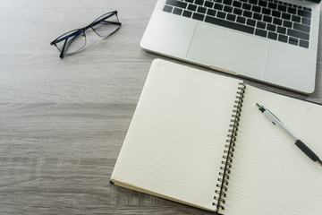 Flat lay laptop grey background