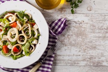 Salad with squid rings.