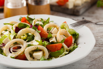 Salad with squid rings.