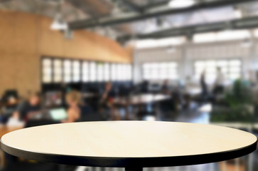 Selected focus empty brown wooden table and Coffee shop or restaurent blur background with bokeh image. for your photomontage or product display