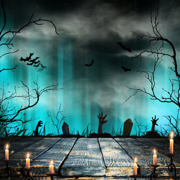 Spooky Halloween background with old trees silhouettes.