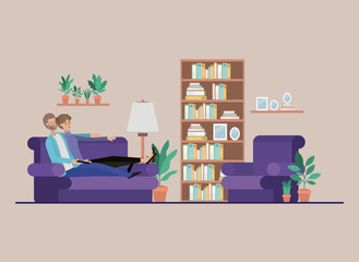 young couple watching tv on the livingroom