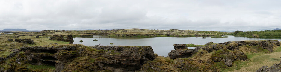 Panorama view of Lake Myvatn with various volcanic rock formations in Iceland