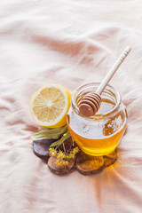 honey and Lemon. The tray on the bed, the Concept of the treatment of colds.