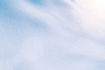 Natural winter background with snow drifts on a winter sunny day