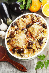 Chicken thigh baked with rice, eggplant and figs