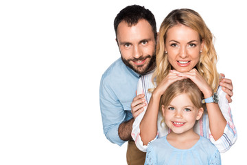 Fototapeta na wymiar smiling family looking at camera isolated on white