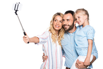 family taking selfie on smartphone isolated on white