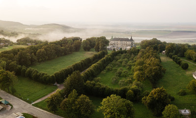 Aerial top view to palace castle in Pidhirci