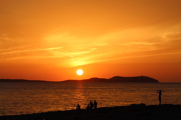 Naklejka na ściany i meble orange and golden sunset in Ibiza