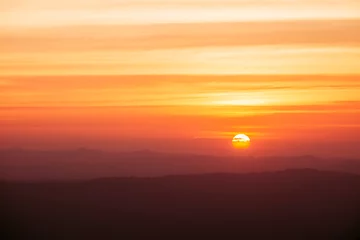 Poster Im Rahmen Dramatic sunset and sunrise over mountain morning twilight evening sky. © sirins