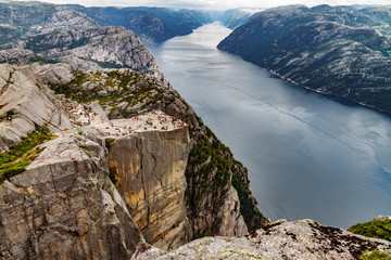Preikestolen, impressive pulpit rock with tourists and fjord