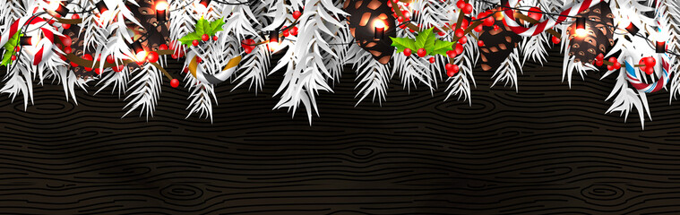 Christmas border (Weihnachten Girlande) with fir branches, pine cones, holly, and string lights. Merry Christmas background with open space for your text.