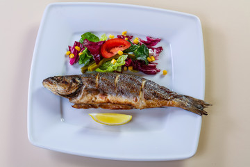 Grilled seabass with lemon