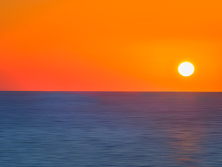 Beautiful red sunset over the blue sea
