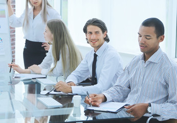 business woman conducts a presentation of a new project