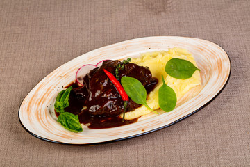 Beef with mushed potato