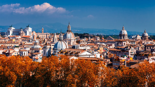 Skyline of Rome, Italy. Panoramic view of Rome architecture and landmark, Rome cityscape. Rome postcard. Autumn skyline with red foliage.
