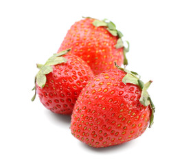Ripe strawberries on white background