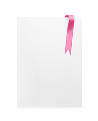 Paper card with pink ribbon on white background