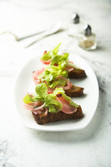 Pickled radish salad on toast