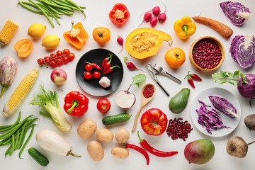 Different vegetables on white background, flat lay