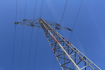 Transmission line on background of blue sky