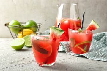Glassware of fresh watermelon lemonade on table