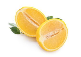 Halves of ripe lemon on white background