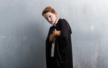 Boy in vampire costume for halloween holidays