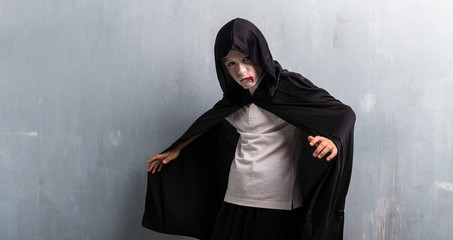 Boy in vampire costume for halloween holidays