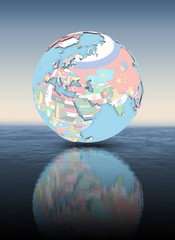 Azerbaijan on globe with flags above water surface
