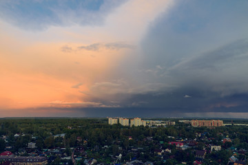 Amazing landscape of bright and dark sky after the rain before sunset.