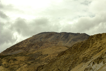 heavy sky in the desert sand mountains