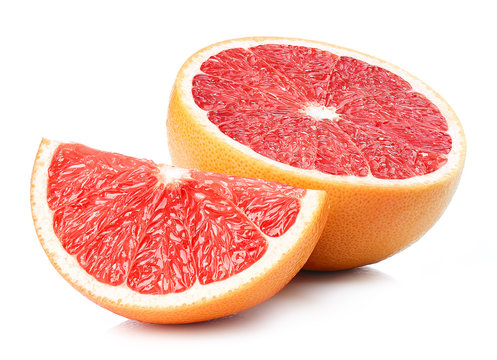 Half and slice of grapefruit