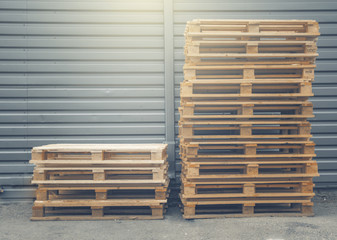 lot of wood pallet in row 