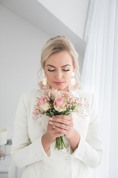 Beautiful bride with elegant makeup