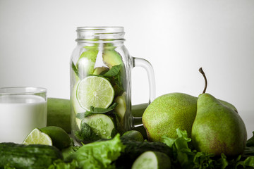Green food. Vegetable harvest and fruit on smoothies.