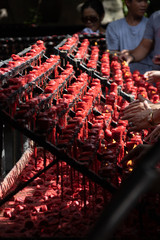 Candels being lit in a church