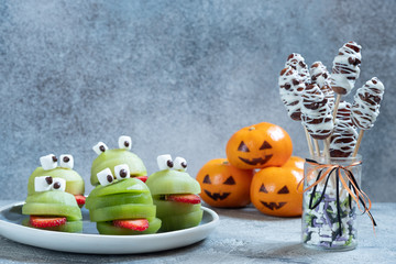 Spooky green kiwi monsters for Halloween