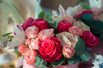 Bridal bouquet of red, pink and white roses