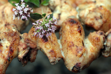 Chicken on the grill to cook